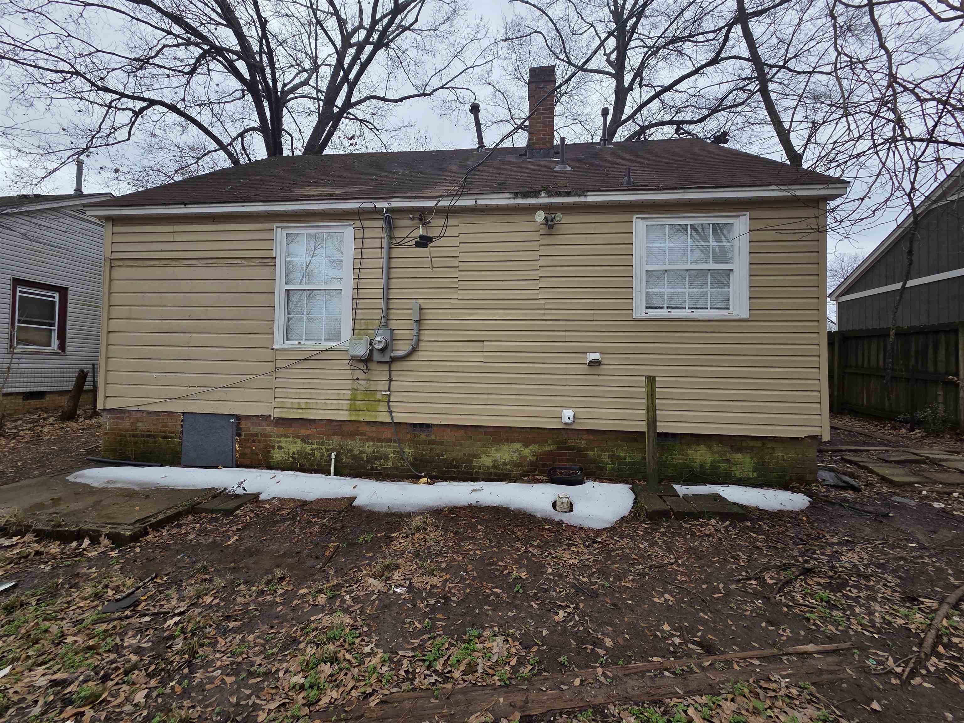 3458 Radford Road Memphis, TN 38111 - Photo 3 of 18 View of property exterior featuring crawl space and a chimney