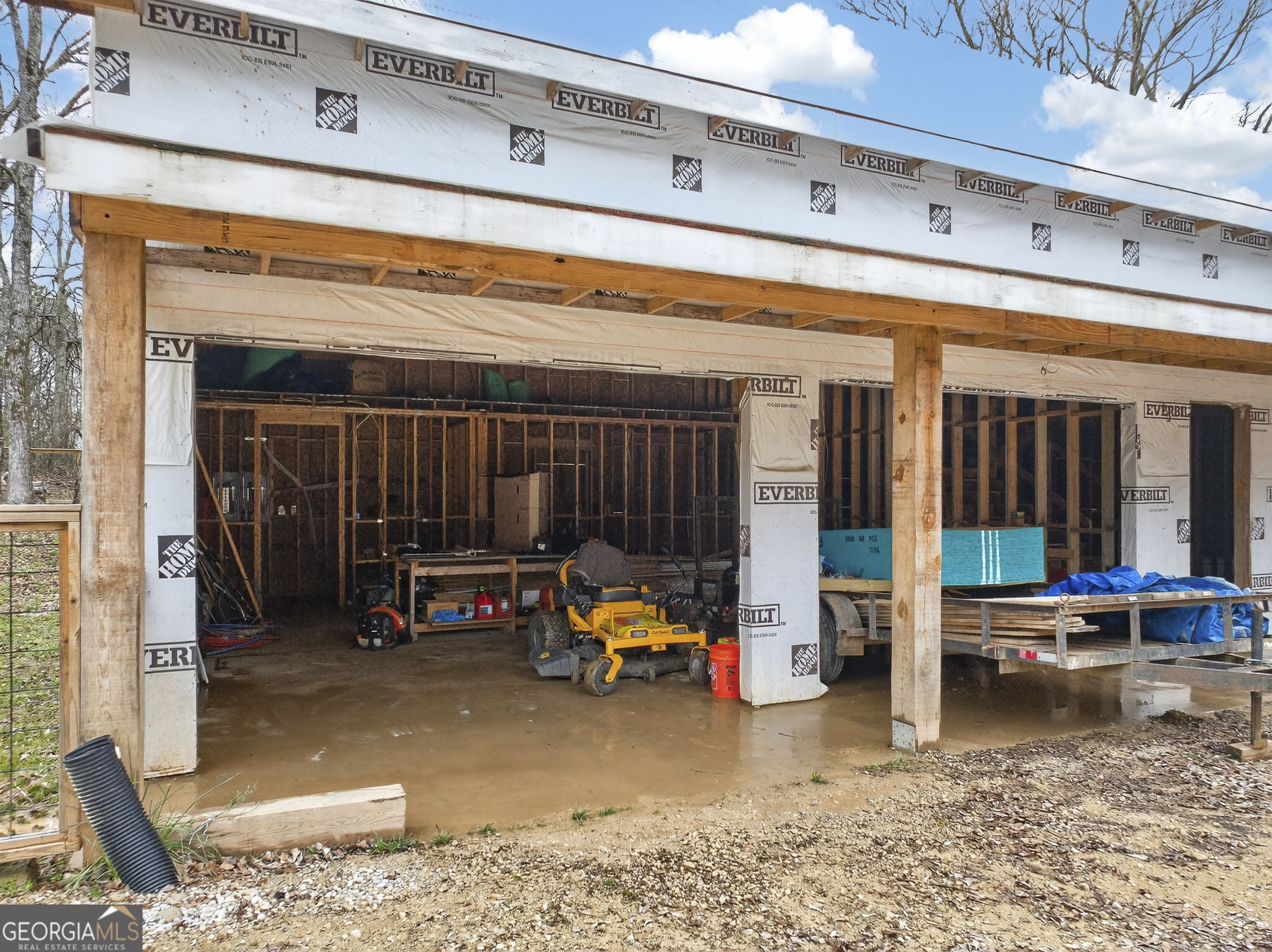 1570 Eley Road White Plains, GA 30678 - Photo 12 of 43 a sitting area with furniture and wooden floor