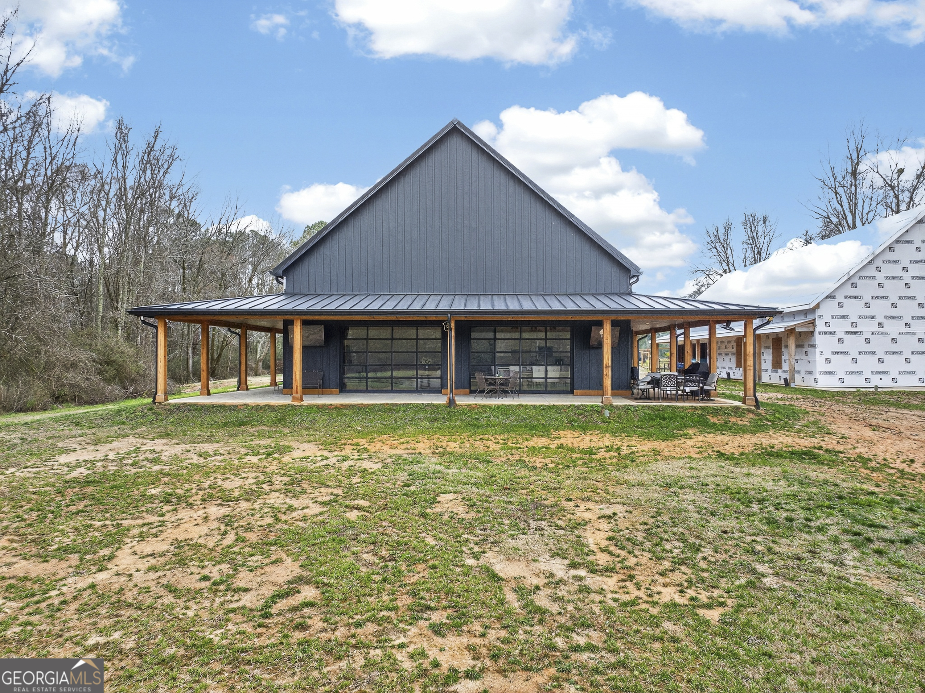 1570 Eley Road White Plains, GA 30678 - Photo 24 of 43 a front view of a house with a garden