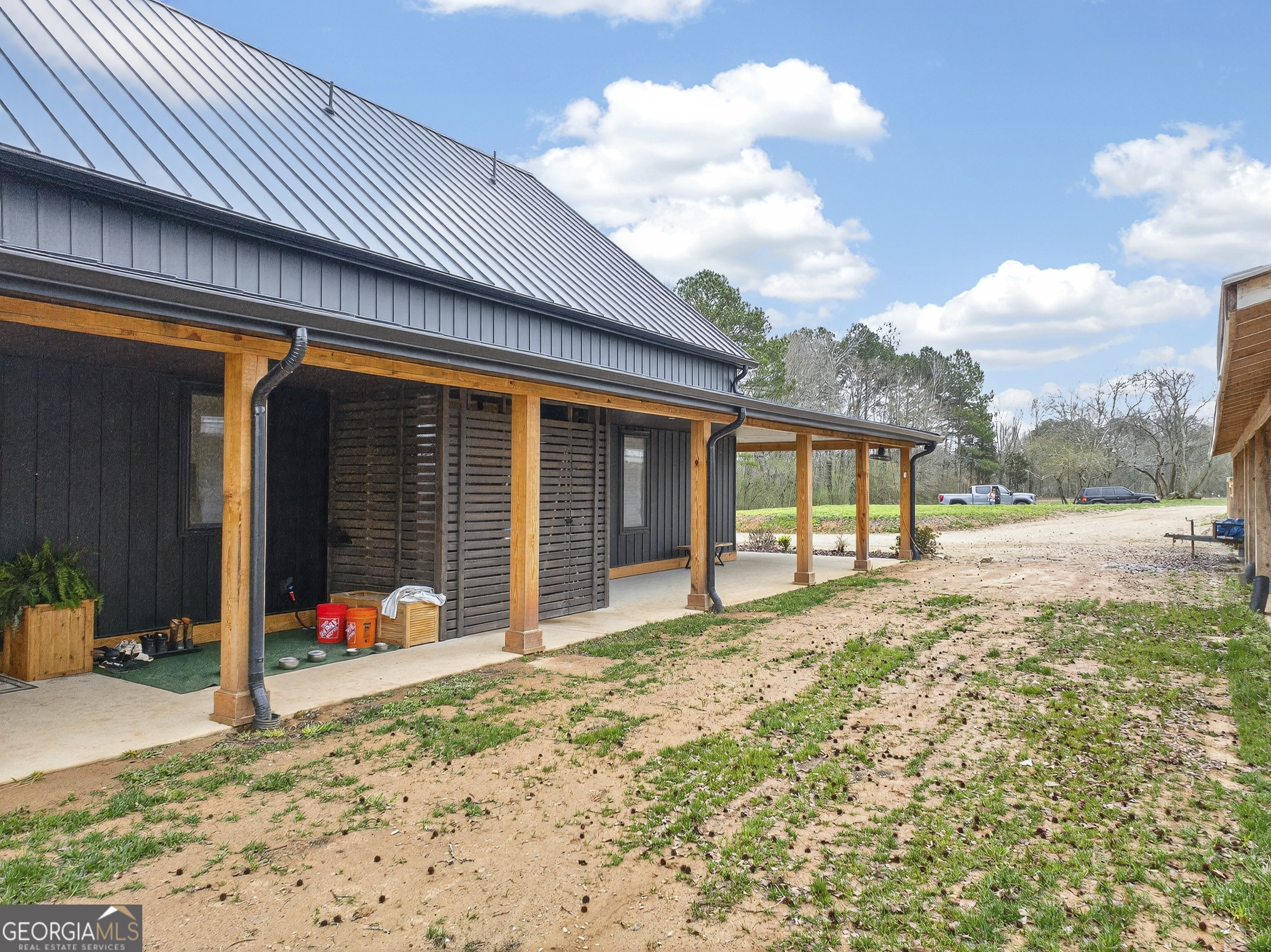1570 Eley Road White Plains, GA 30678 - Photo 25 of 43 a view of a house with backyard porch and sitting area