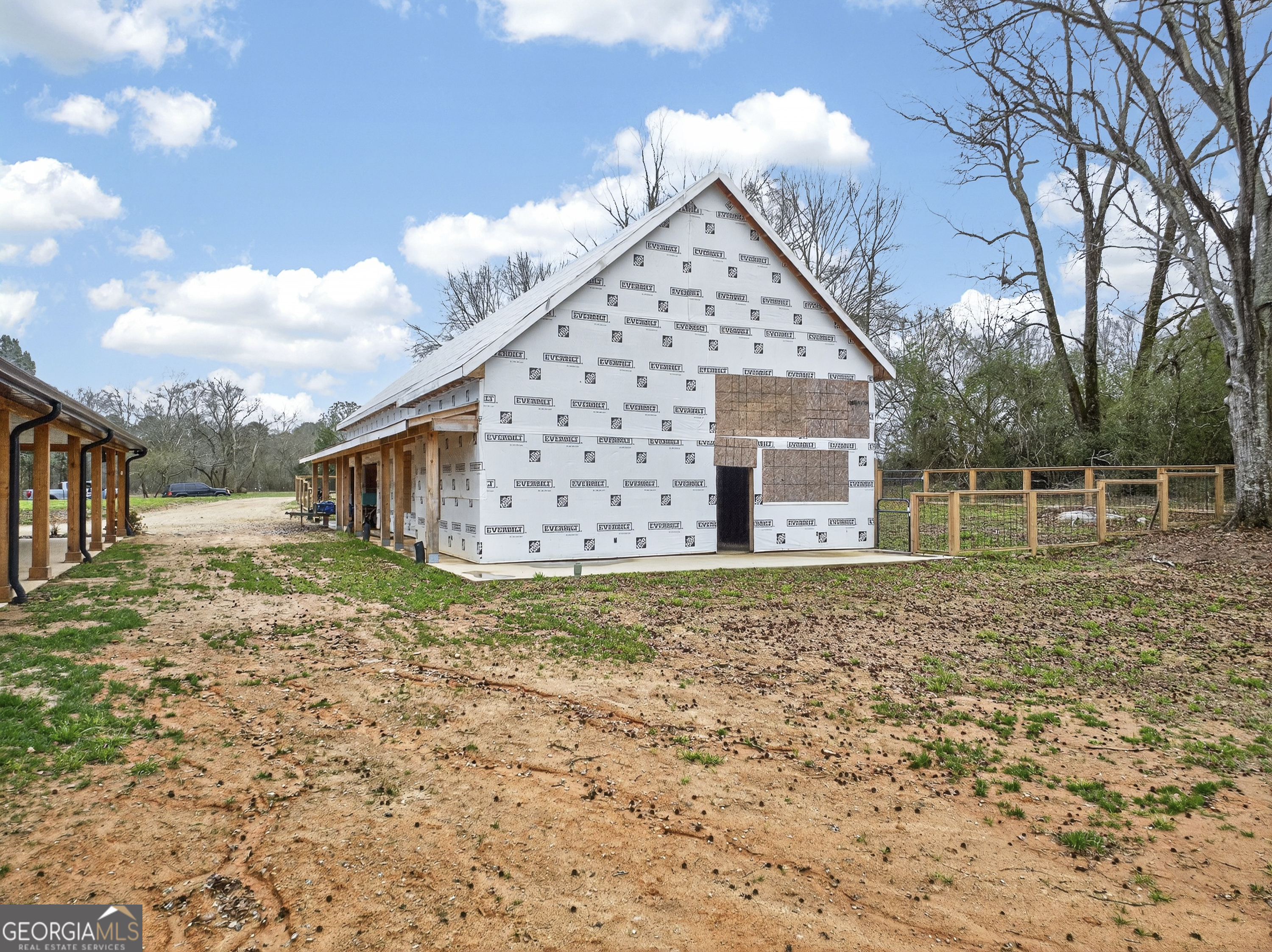 1570 Eley Road White Plains, GA 30678 - Photo 26 of 43 a front view of a house with a yard