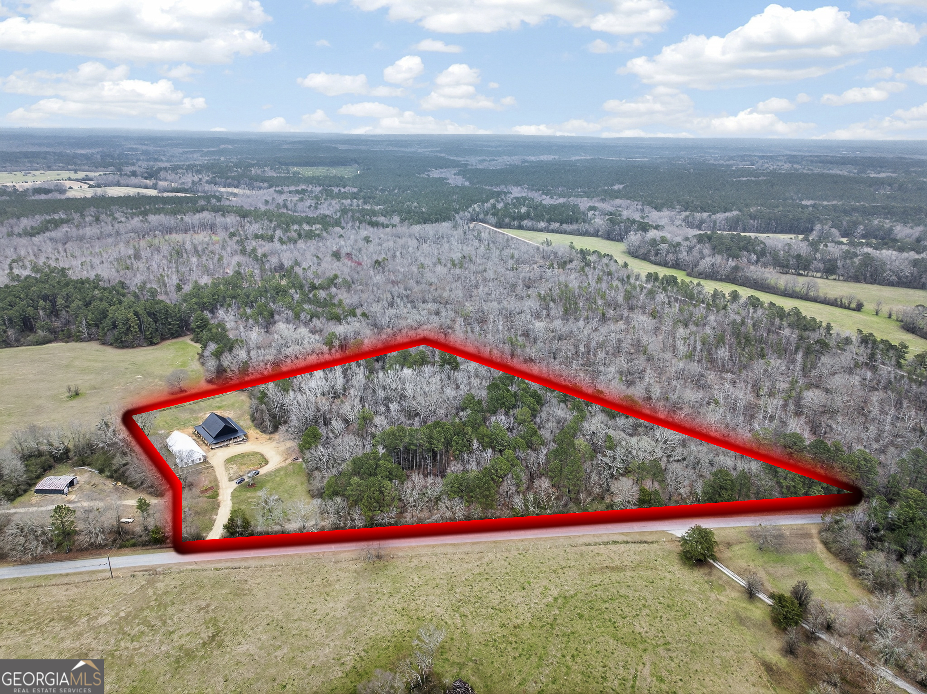 1570 Eley Road White Plains, GA 30678 - Photo 3 of 43 a view of a yard in front of a house