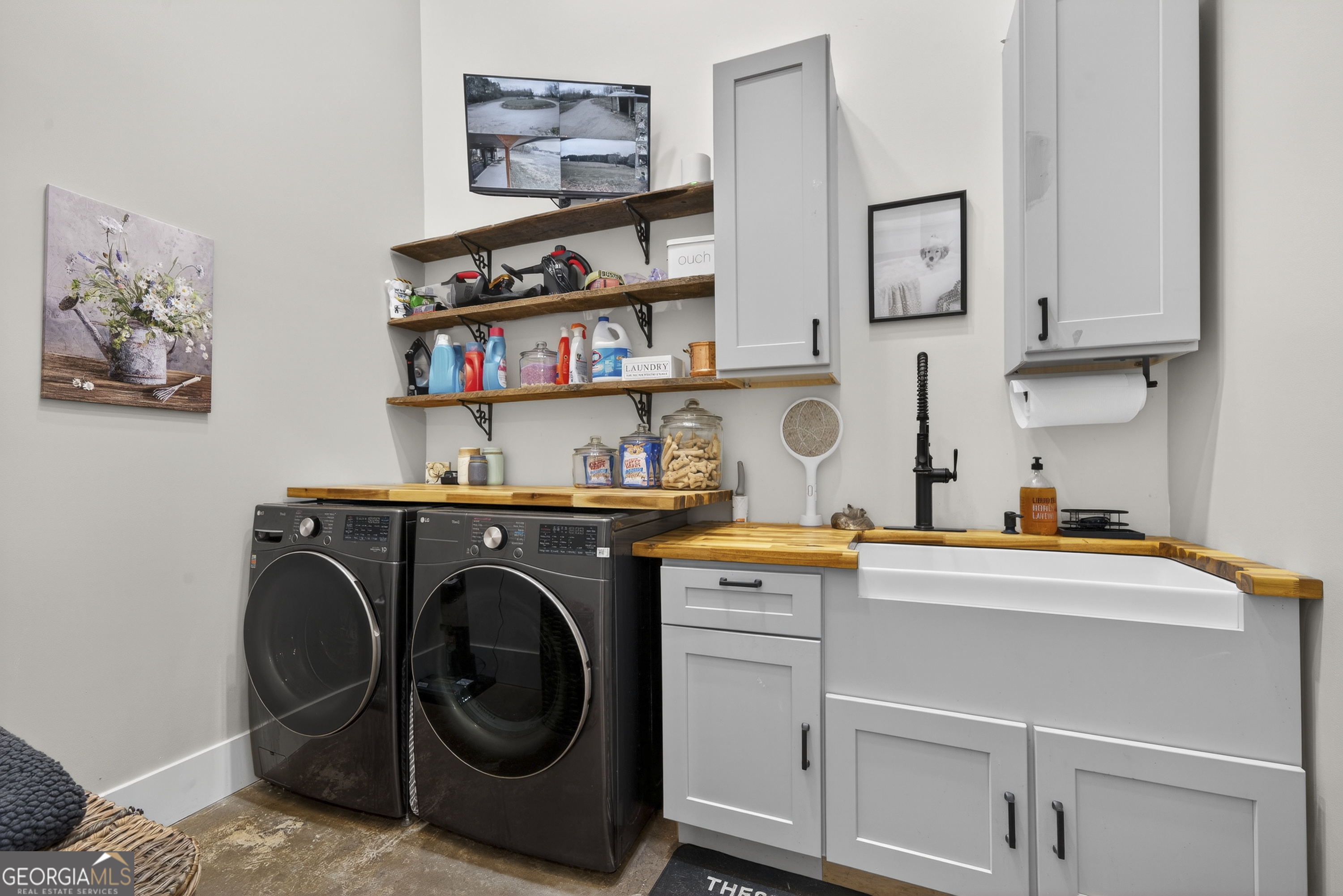 1570 Eley Road White Plains, GA 30678 - Photo 32 of 43 a utility room with sink dryer and washer