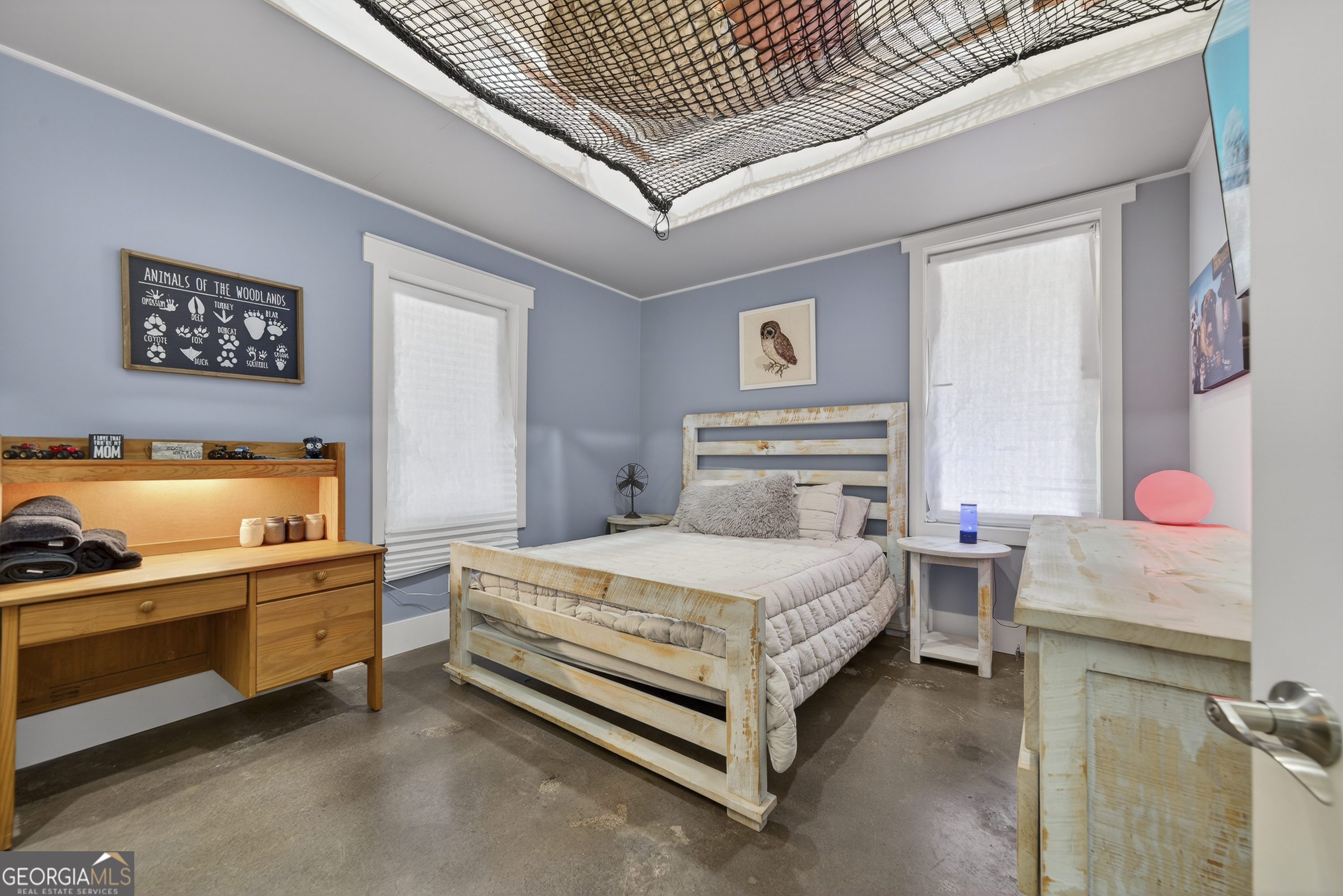 1570 Eley Road White Plains, GA 30678 - Photo 36 of 43 a bedroom with a bed and dresser