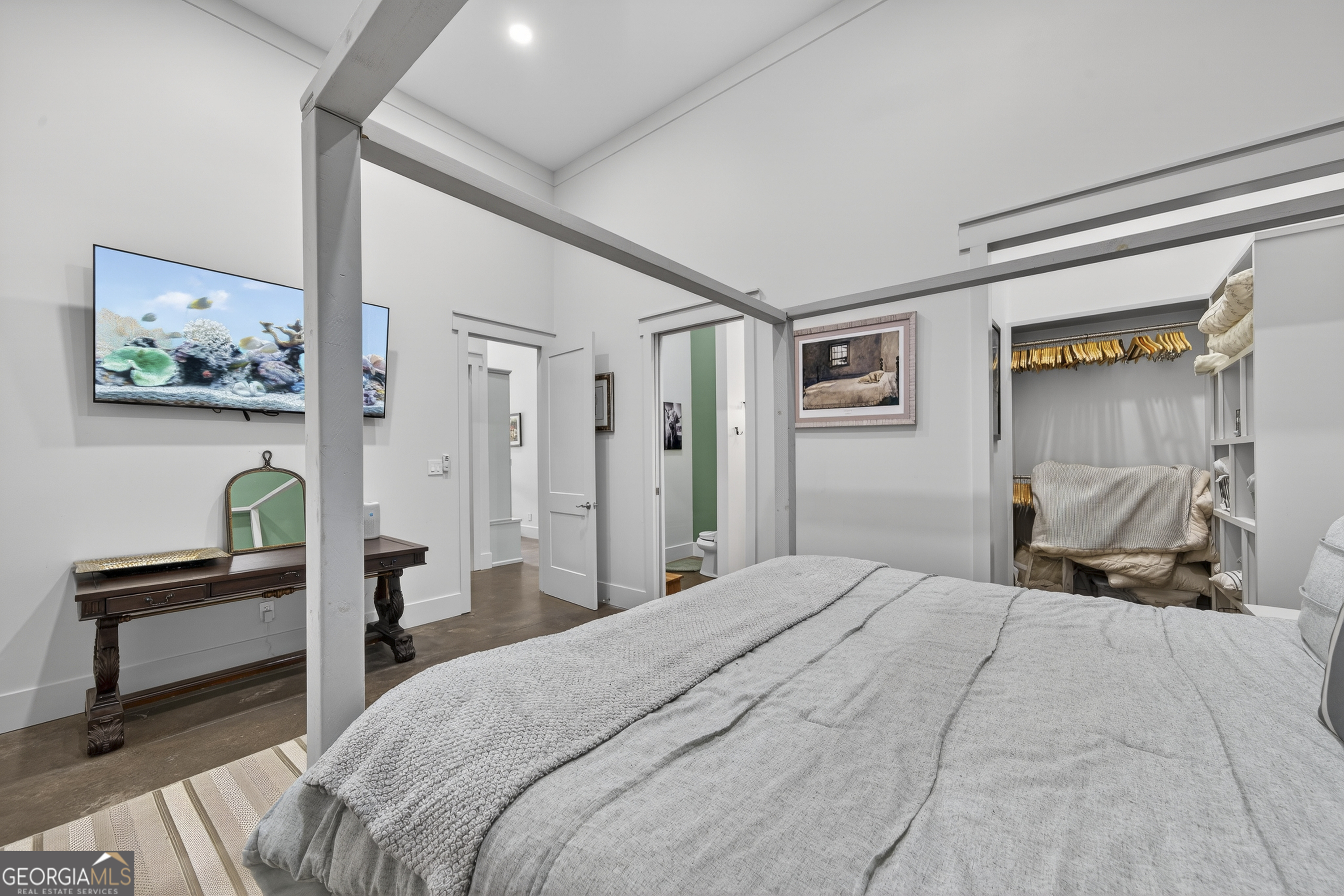 1570 Eley Road White Plains, GA 30678 - Photo 40 of 43 a bedroom with a bed and a cabinets