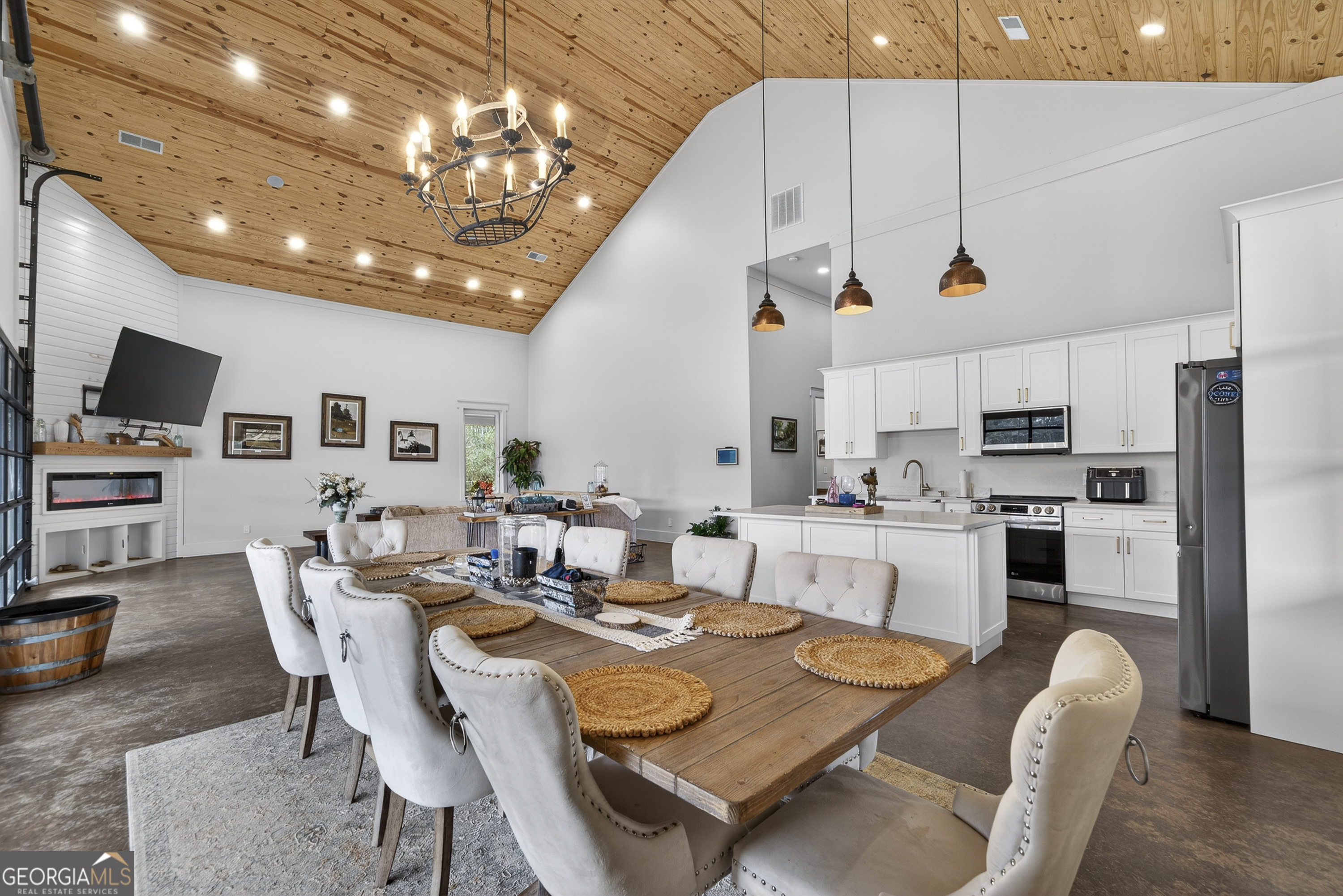 1570 Eley Road White Plains, GA 30678 - Photo 43 of 43 a dining room with kitchen island a table and chairs
