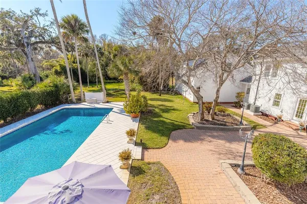 a view of a building with a yard