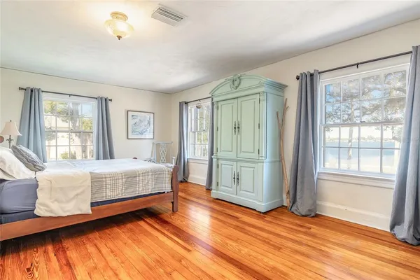 a view of a swimming pool with an outdoor seating