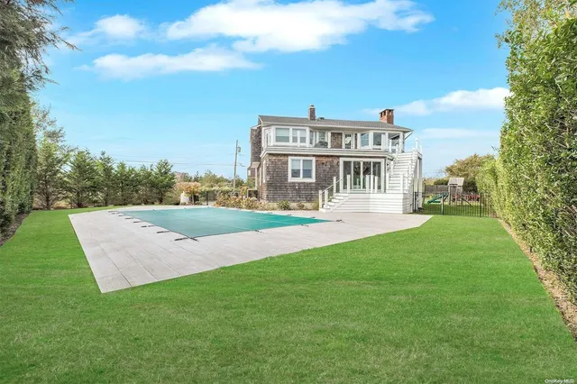 a view of a house with a big yard