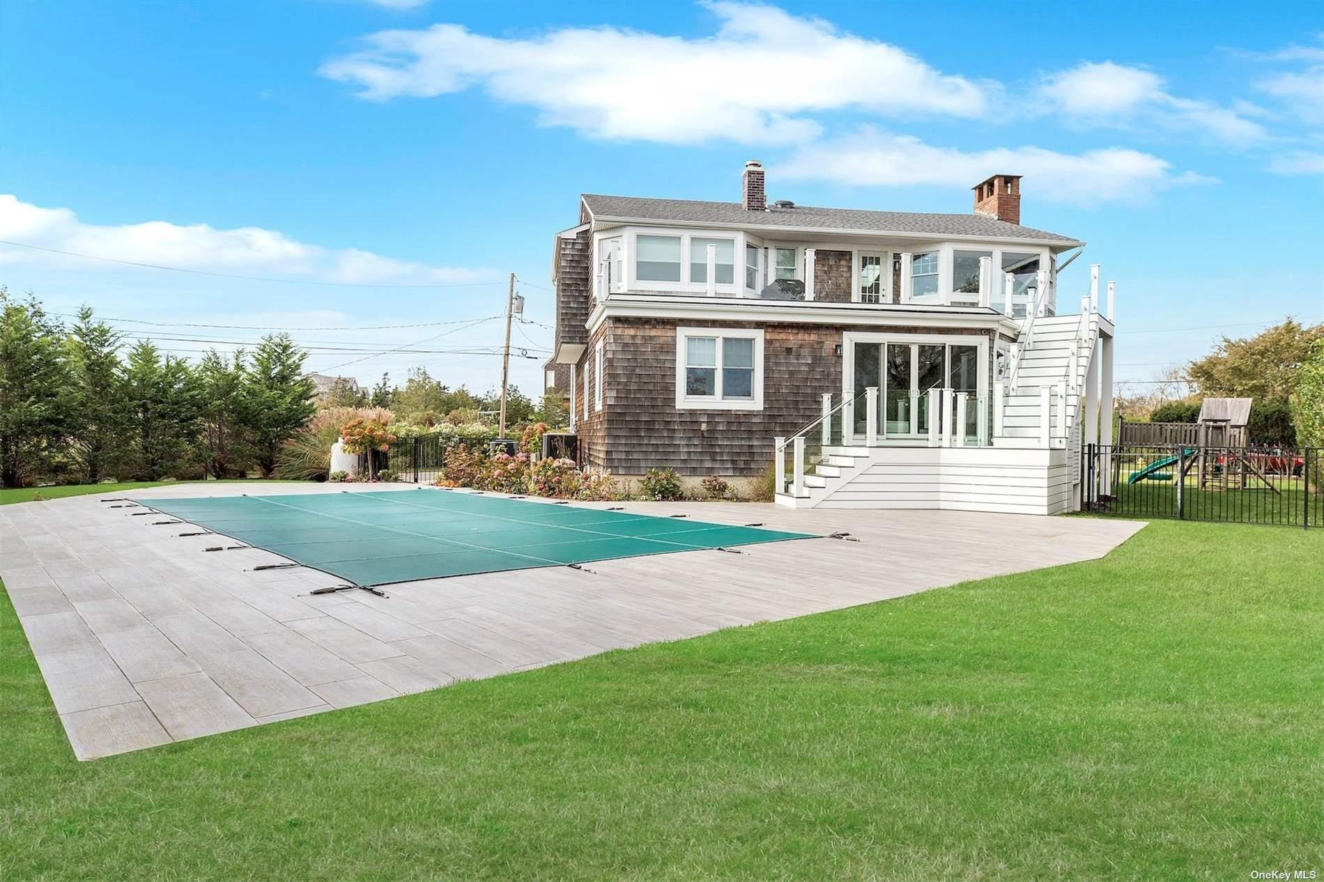 25 Exchange Westhampton Beach, NY 11978 - Photo 28 of 31 a front view of a house with a yard