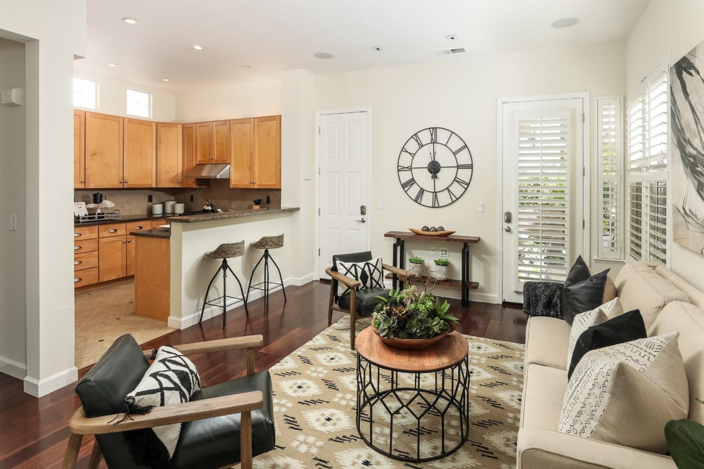 555 Front Lane Mountain View, CA 94041 - Photo 12 of 31 a living room with furniture a rug and a large window