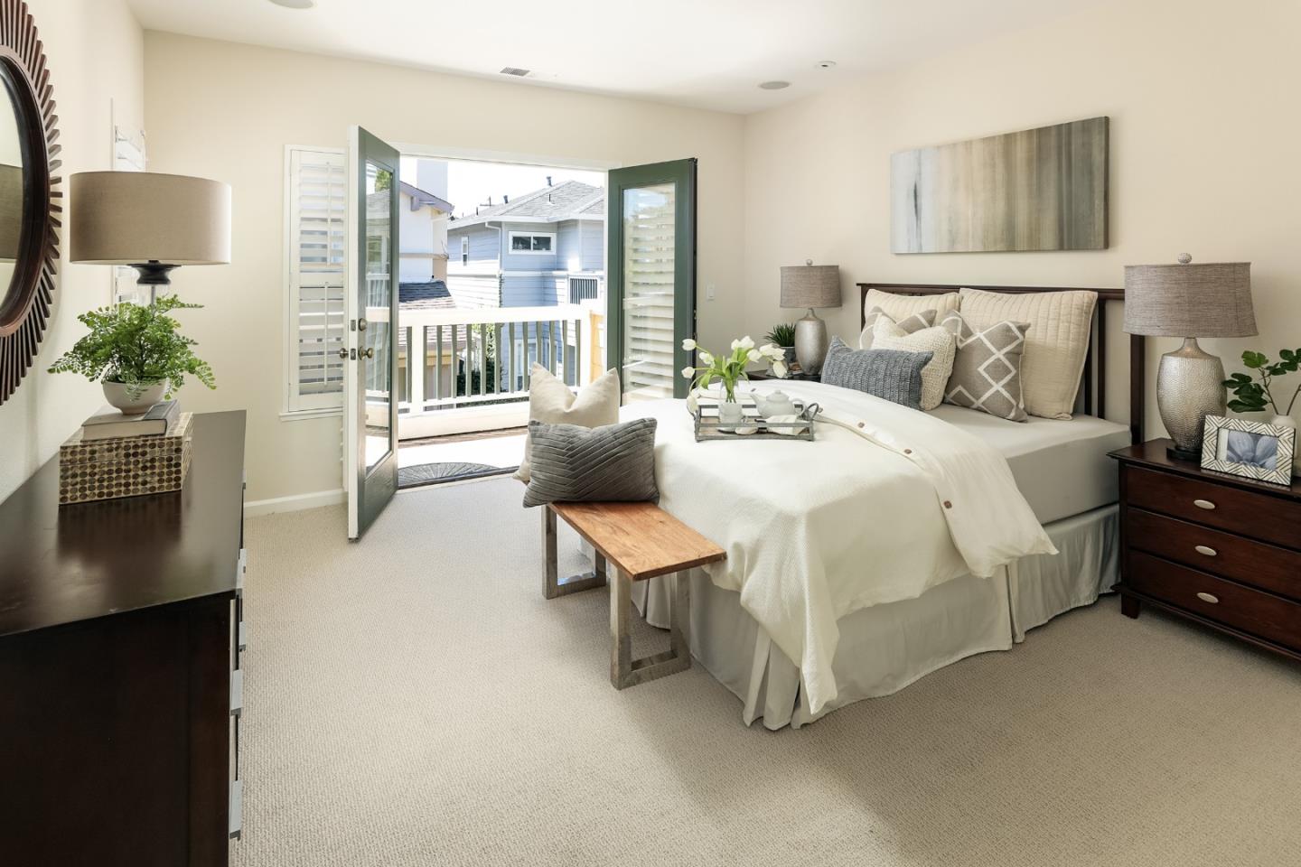 555 Front Lane Mountain View, CA 94041 - Photo 17 of 31 a bedroom with a bed and a potted plant