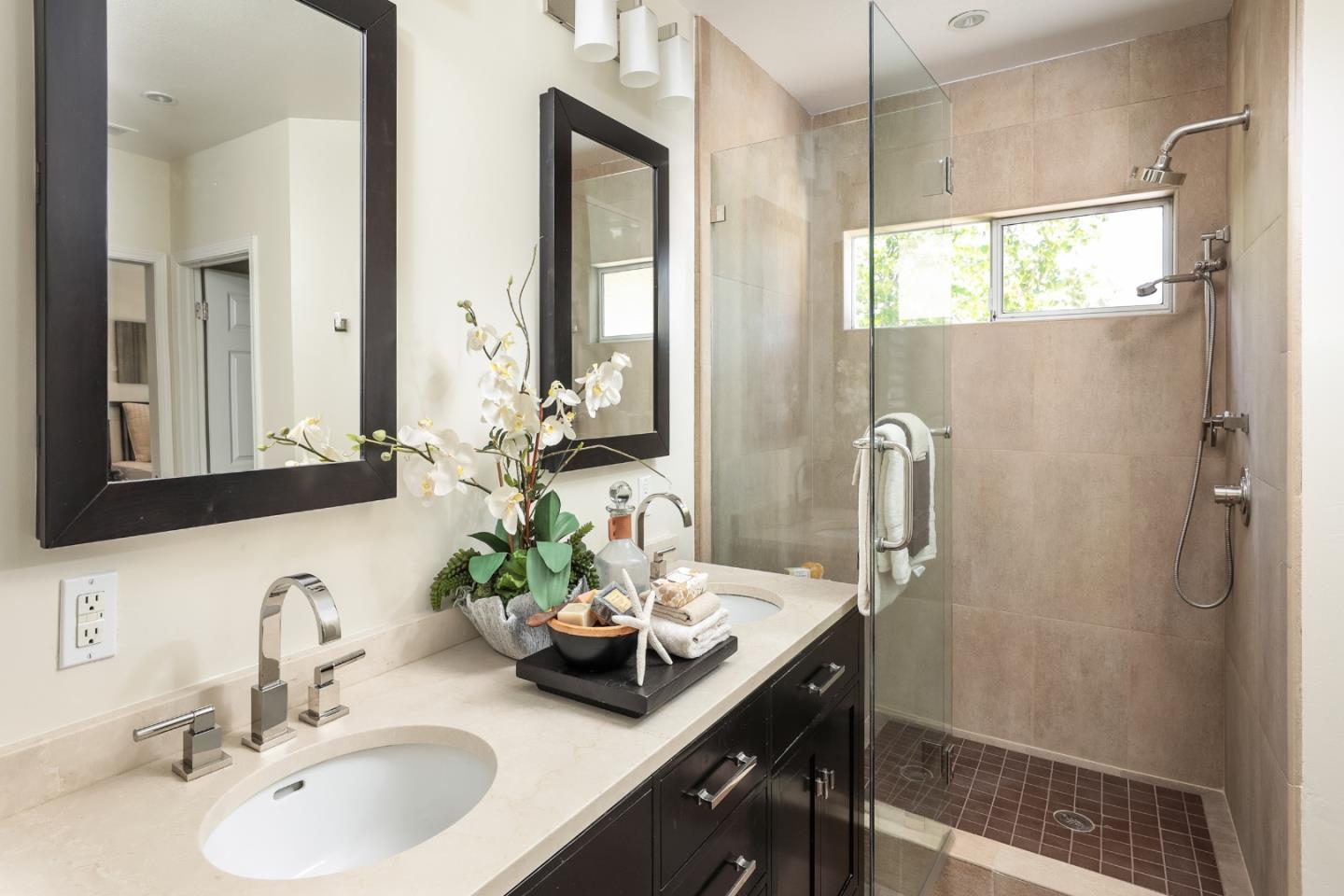 555 Front Lane Mountain View, CA 94041 - Photo 19 of 31 a bathroom with double sink and a mirror