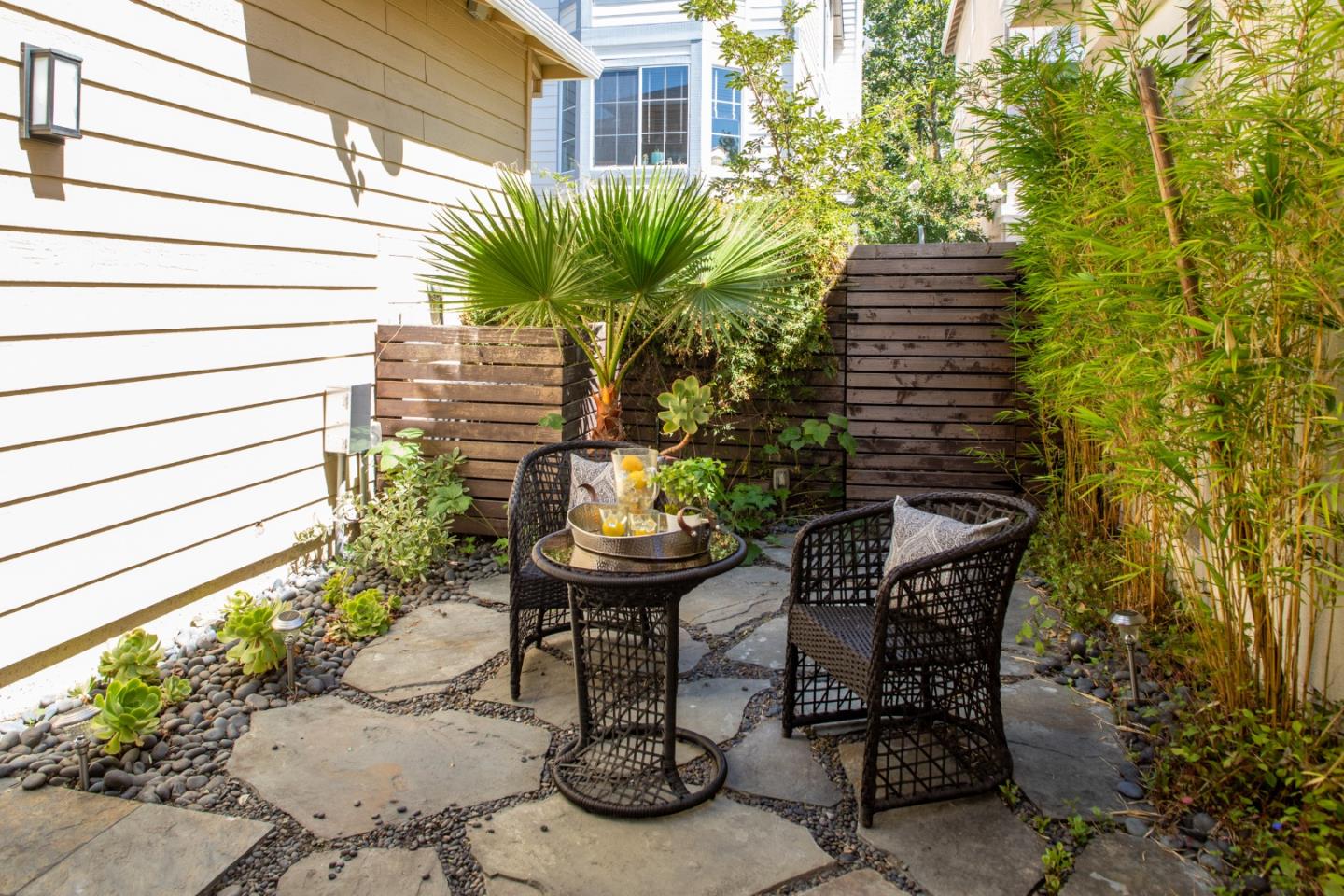 555 Front Lane Mountain View, CA 94041 - Photo 29 of 31 a view of balcony with table and chairs and potted plants