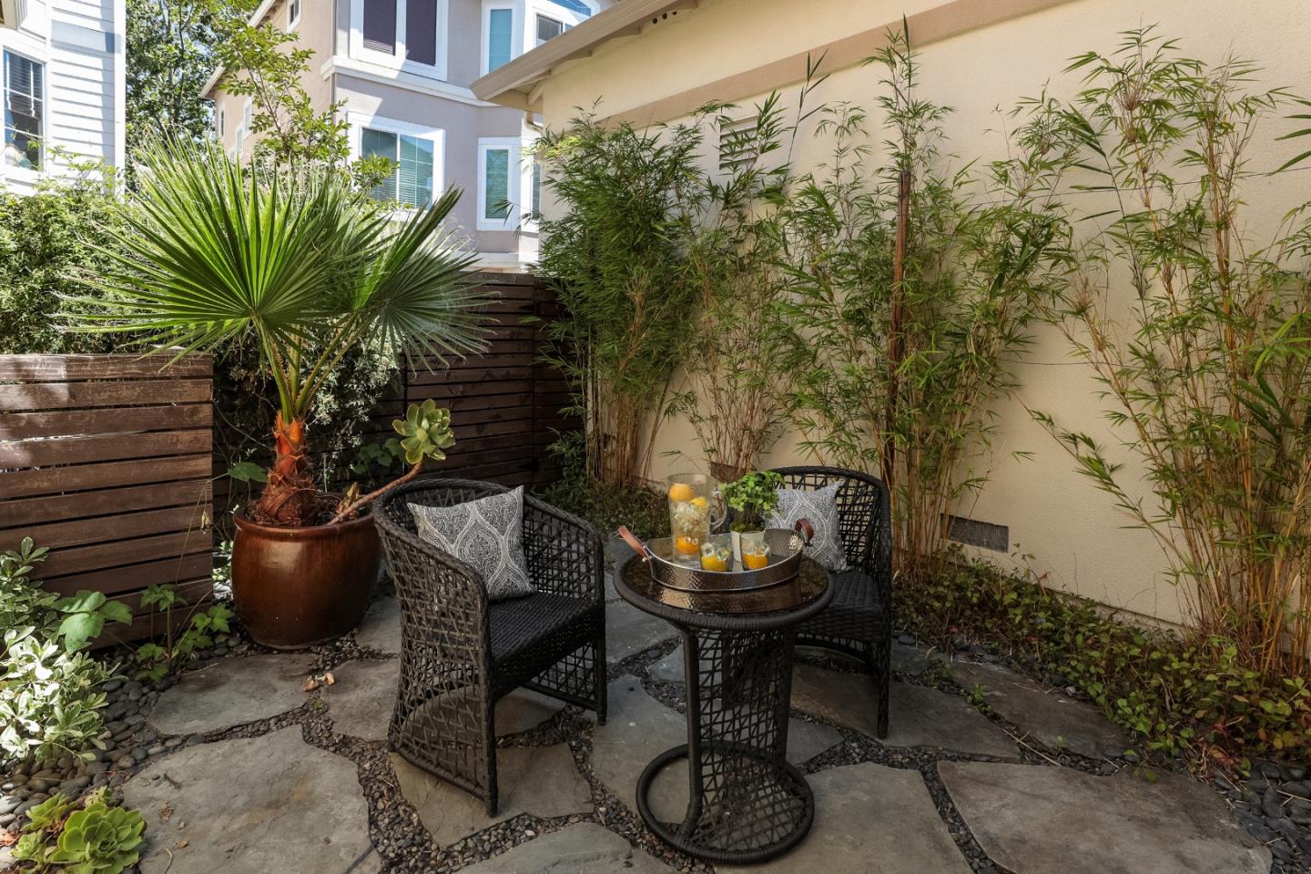555 Front Lane Mountain View, CA 94041 - Photo 30 of 31 a view of a balcony with chair and potted plants