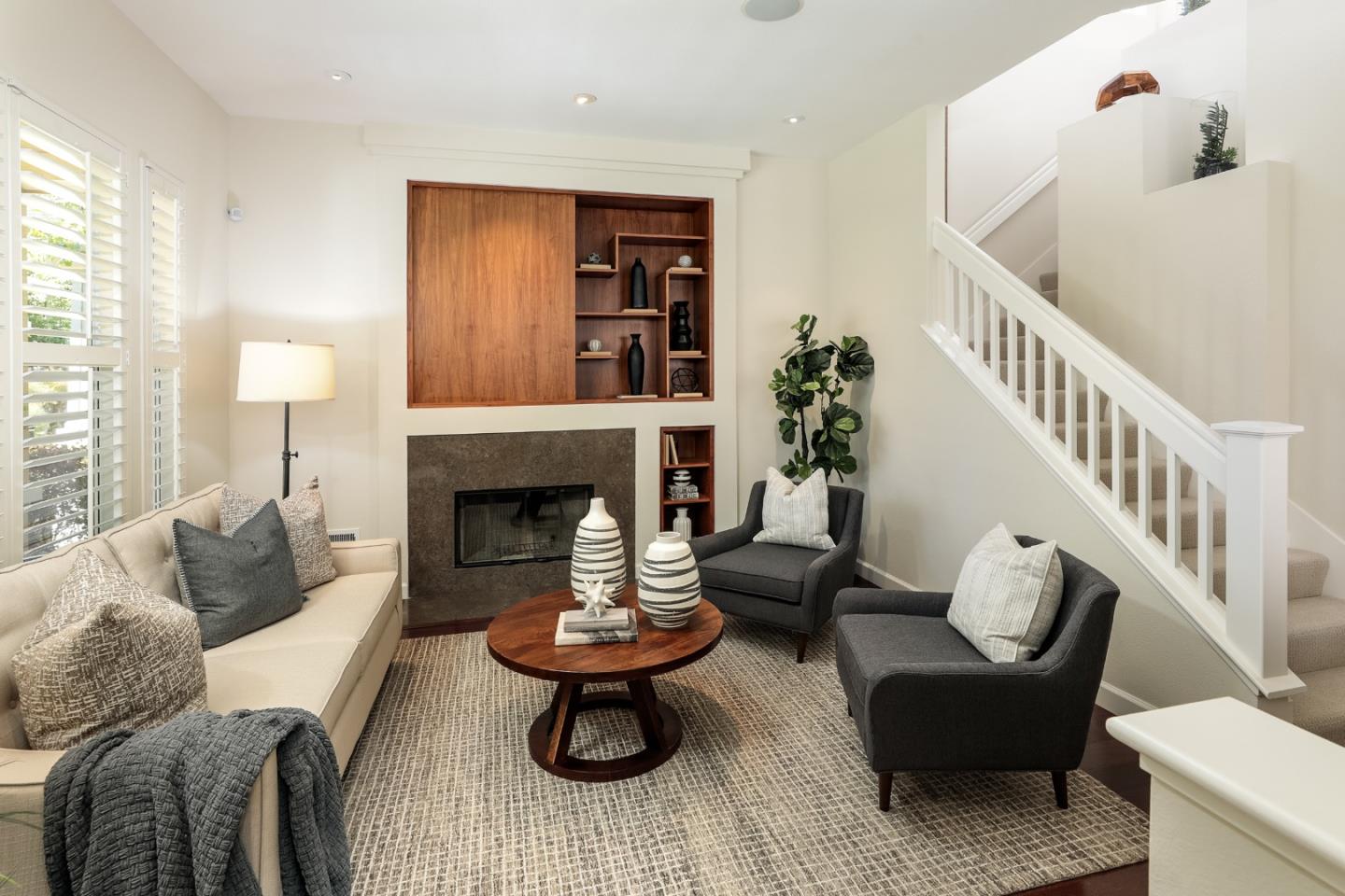 555 Front Lane Mountain View, CA 94041 - Photo 5 of 31 a living room with furniture and a fireplace