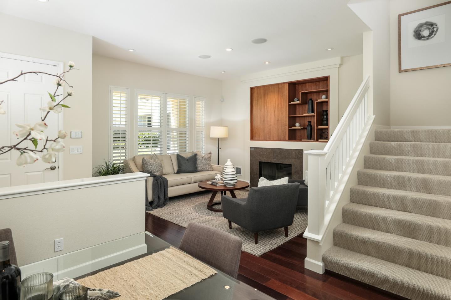 555 Front Lane Mountain View, CA 94041 - Photo 8 of 31 a living room with furniture a fireplace and a window