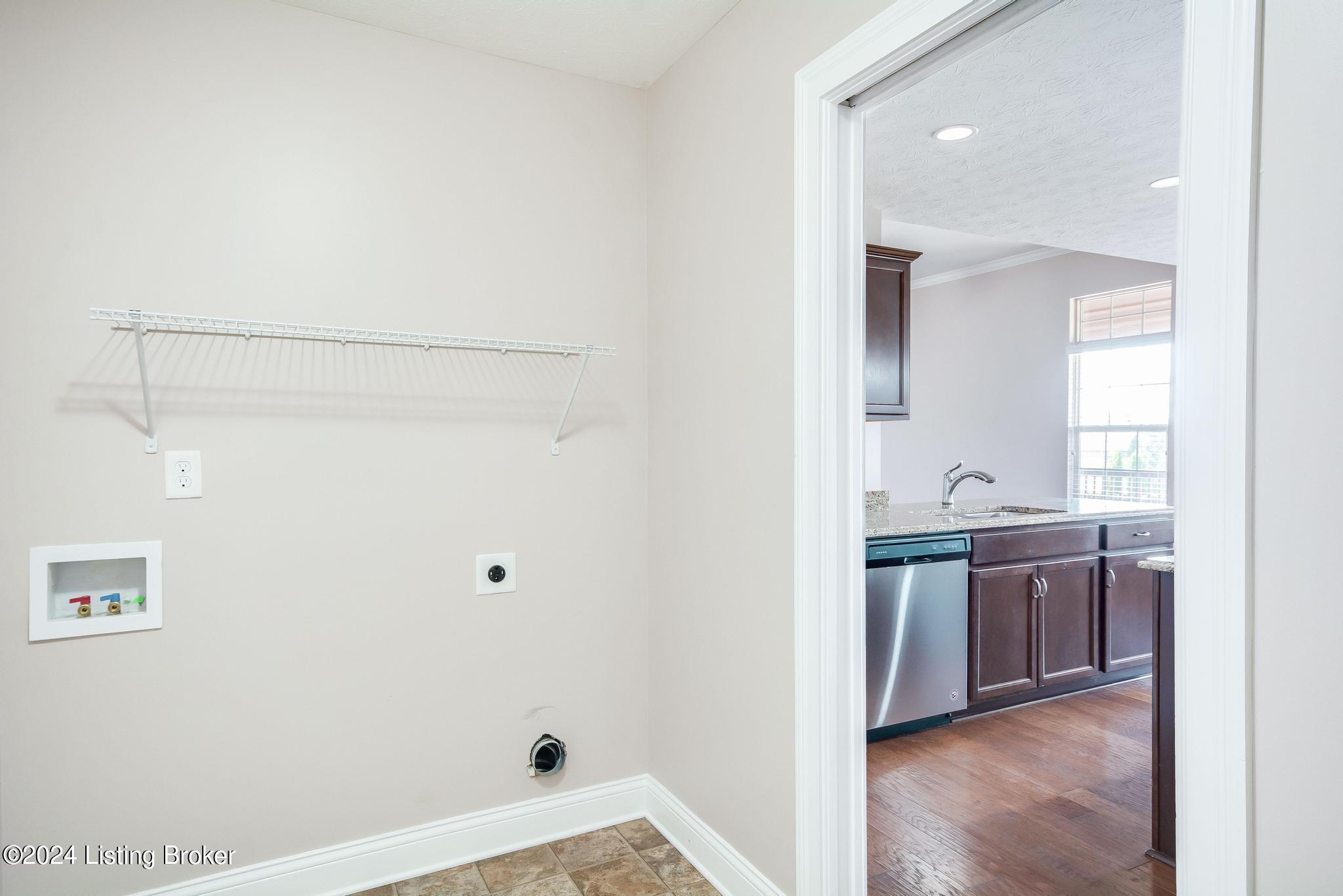283 Autumn Ridge Drive Mount Washington, KY 40047 - Photo 25 of 41 Laundry Room located on the 1st floor, with shelving for your laundry needs and room for additional storage.
