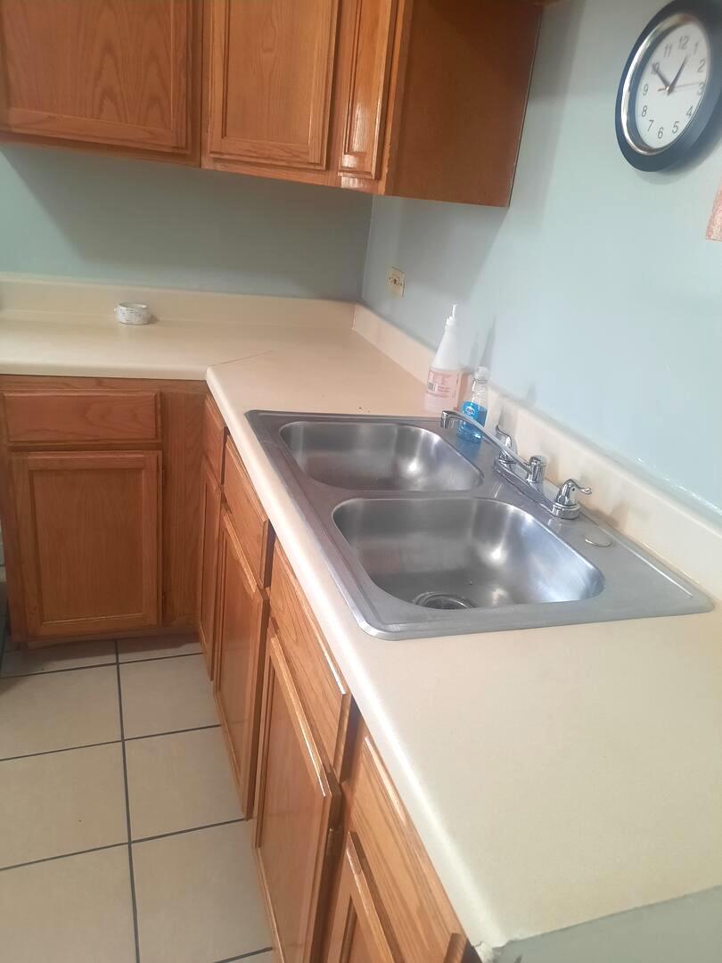 6221 South Laflin Street, Unit 2 Chicago, IL 60636 - Photo 12 of 20 a kitchen with a sink and cabinets