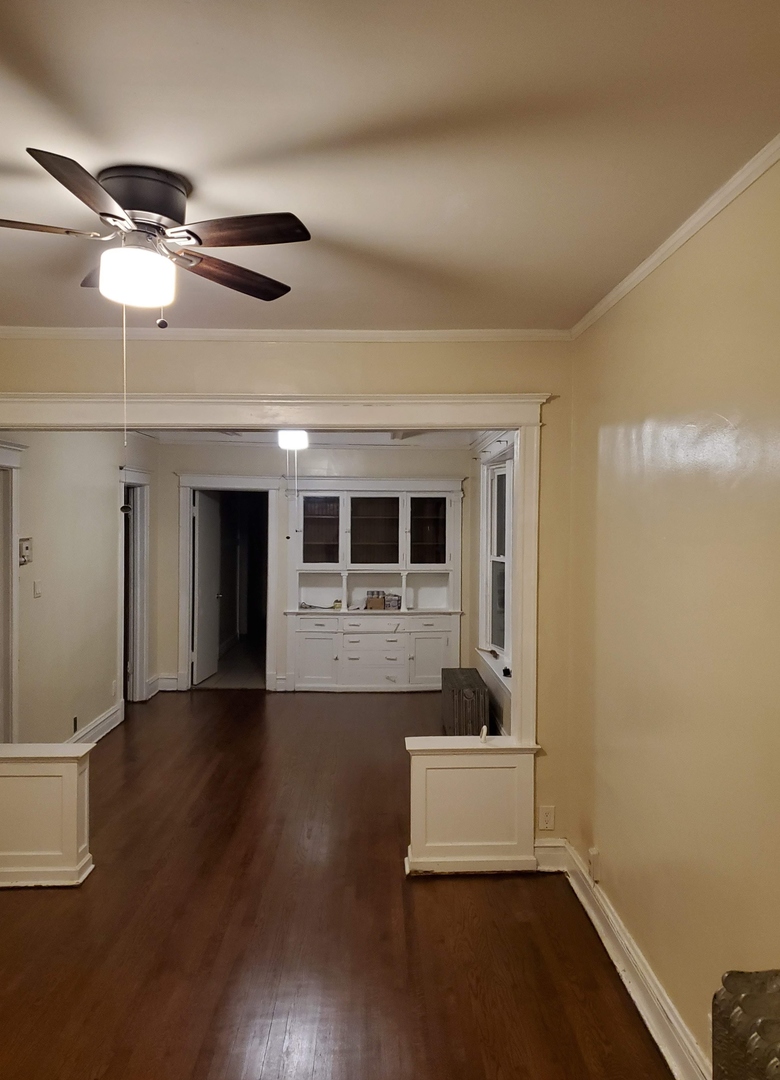 6221 South Laflin Street, Unit 2 Chicago, IL 60636 - Photo 5 of 20 a living room with wooden floor and ceiling fan