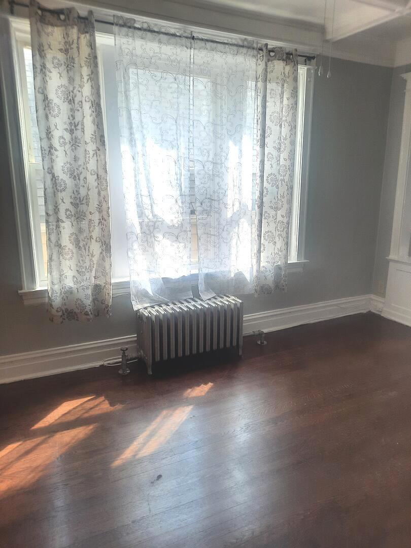 6221 South Laflin Street, Unit 2 Chicago, IL 60636 - Photo 6 of 20 a bedroom with a bed and a window