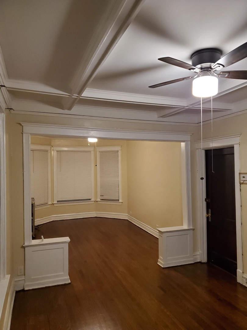 6221 South Laflin Street, Unit 2 Chicago, IL 60636 - Photo 7 of 20 a view of an empty room with wooden floor