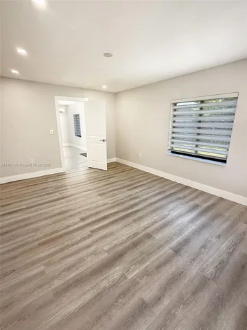a view of a kitchen with a sink