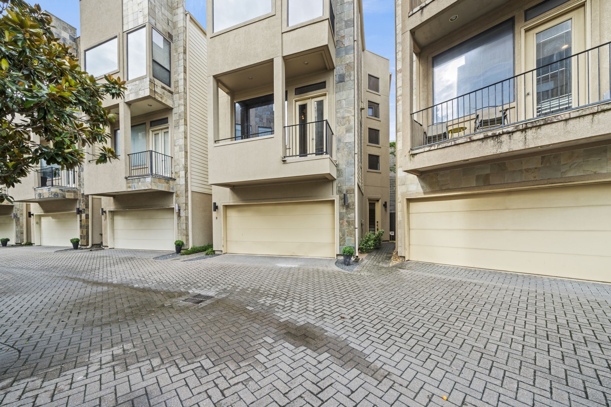 2413 Ralph Street, Unit 9 Houston, TX 77006 - Photo 1 of 19 Welcome to 2413 Ralph Street #9, where exceptional walkability meets effortless living in the heart of Montrose. Nestled within a gated community, this move-in ready home offers a spacious open-concept design with soaring ceilings, rich wood flooring, and oversized windows that fill the home with natural light.