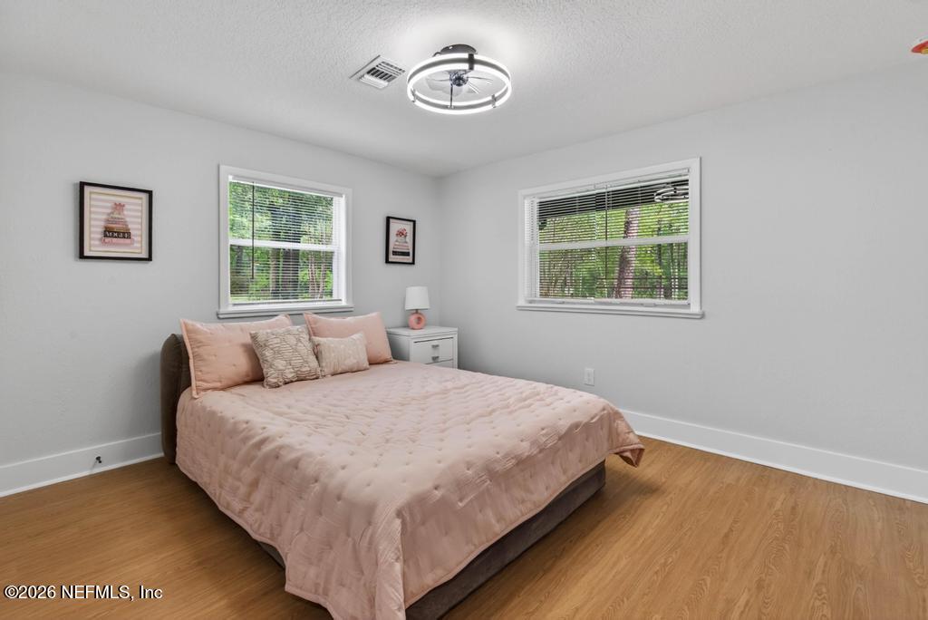 43739 Ratliff Road Callahan, FL 32011 - Photo 41 of 55 a bedroom with a bed and a window