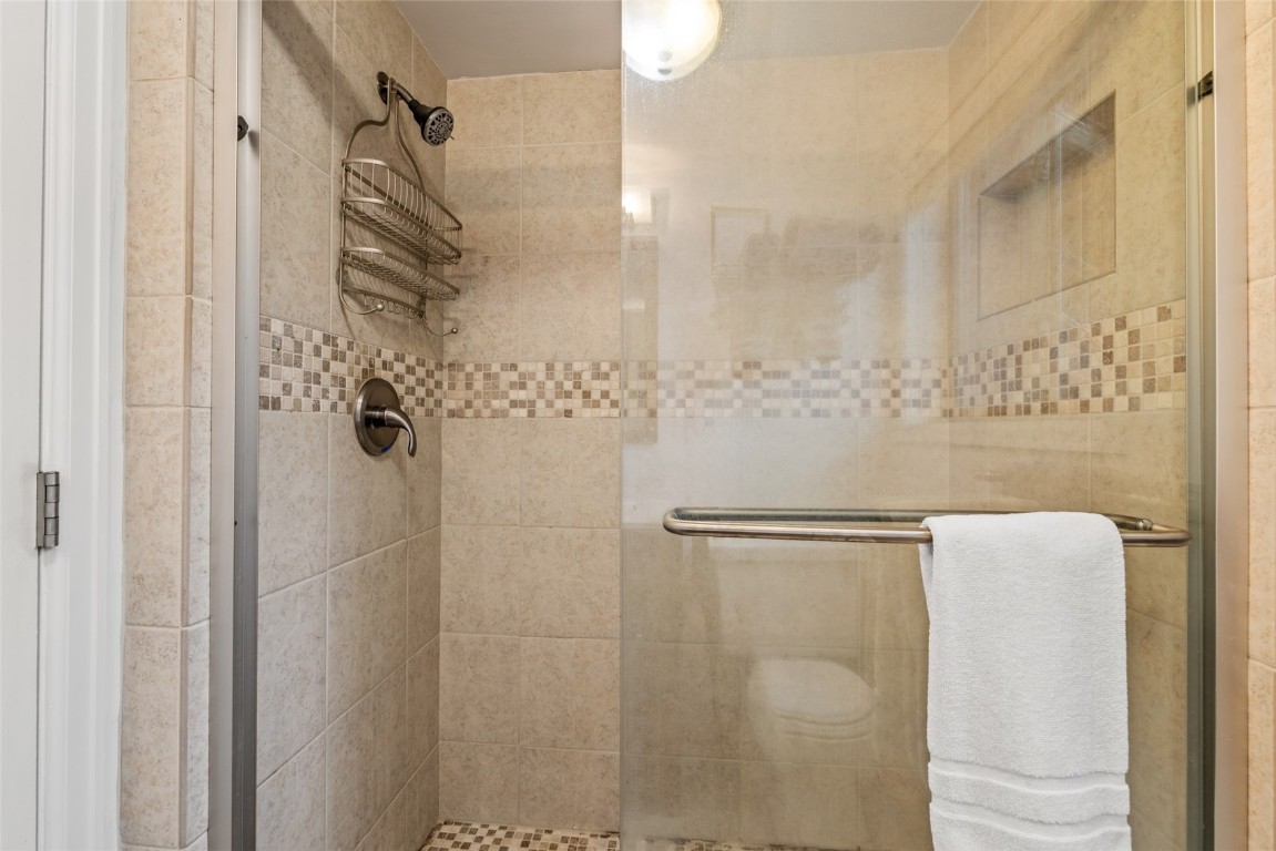 1565 Shadow Run Frontage, Unit B103 Steamboat Springs, CO 80487 - Photo 11 of 28 a bathroom with a shower