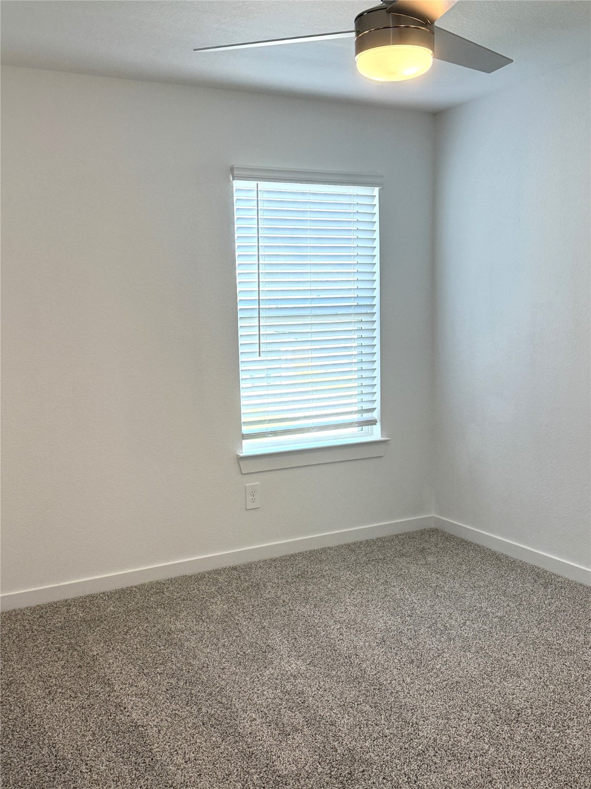 4308 Wallace Falls Lane Conroe, TX 77303 - Photo 15 of 27 an empty room with a window