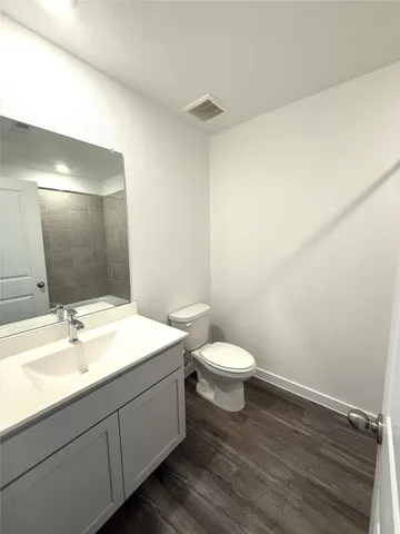 a bathroom with a sink and a toilet