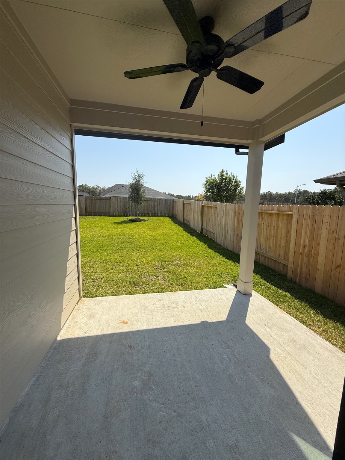 4308 Wallace Falls Lane Conroe, TX 77303 - Photo 26 of 27 a view of an outdoor space and deck