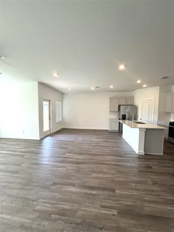 a view of kitchen view with wooden floor