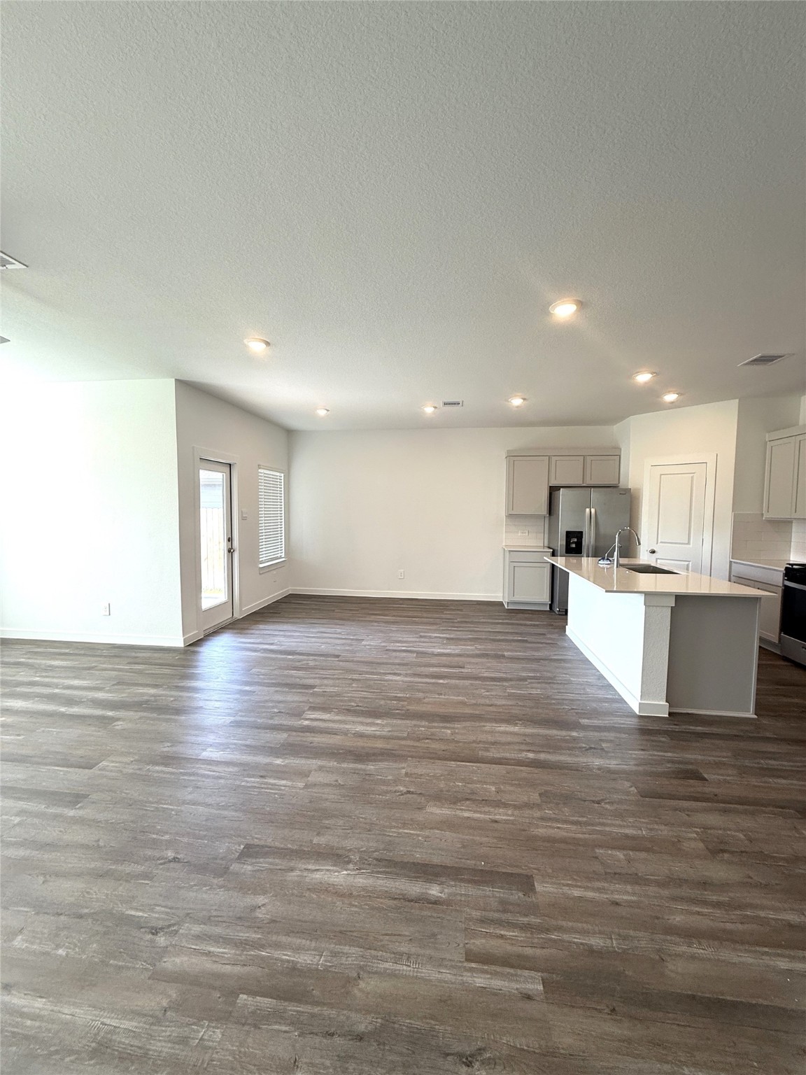 4308 Wallace Falls Lane Conroe, TX 77303 - Photo 4 of 27 a view of kitchen view with wooden floor