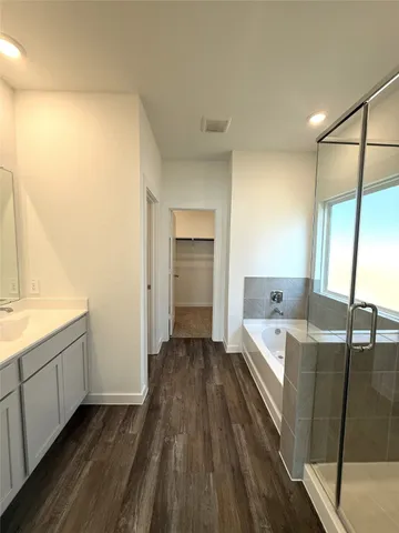 a kitchen with sink and cabinets