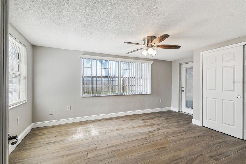 10837 Oldham Road Port Richey, FL 34668 - Photo 11 of 29 Back bedroom/Bonus room