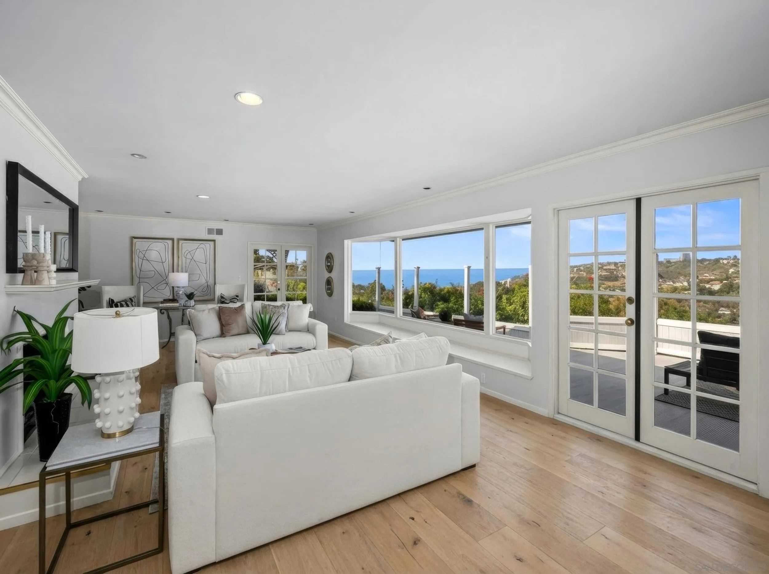 7753 Via Capri La Jolla, CA 92037 - Photo 13 of 65 Photo has been enhance to show what replacement of the flooring with hardwood floors would look like.