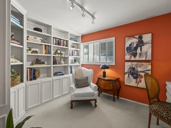 a bed room with a bed and a night stand