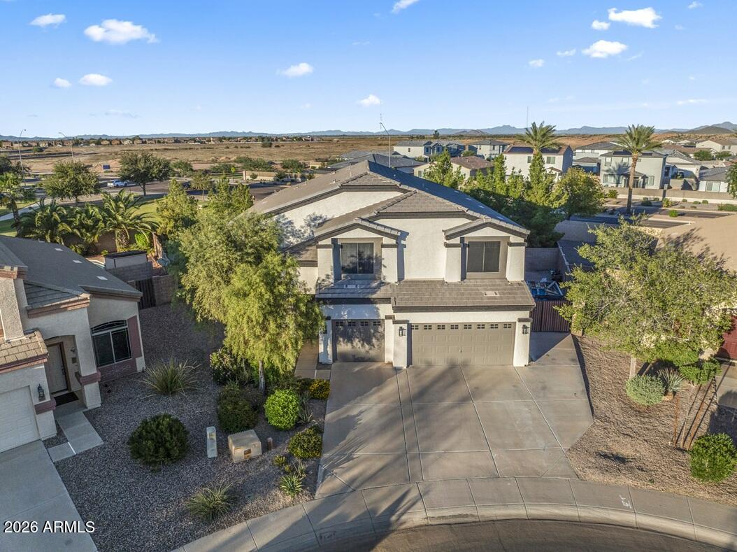 a view of a terrace with a garden and potted plants