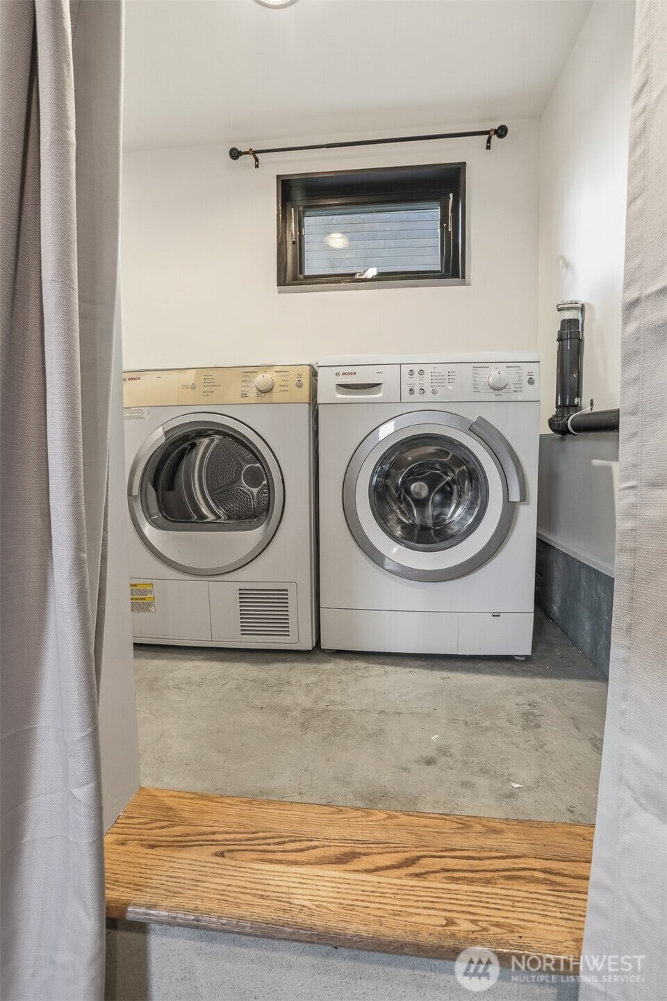3868 16th Avenue Southwest Seattle, WA 98106 - Photo 12 of 37 a utility room with a washer and dryer