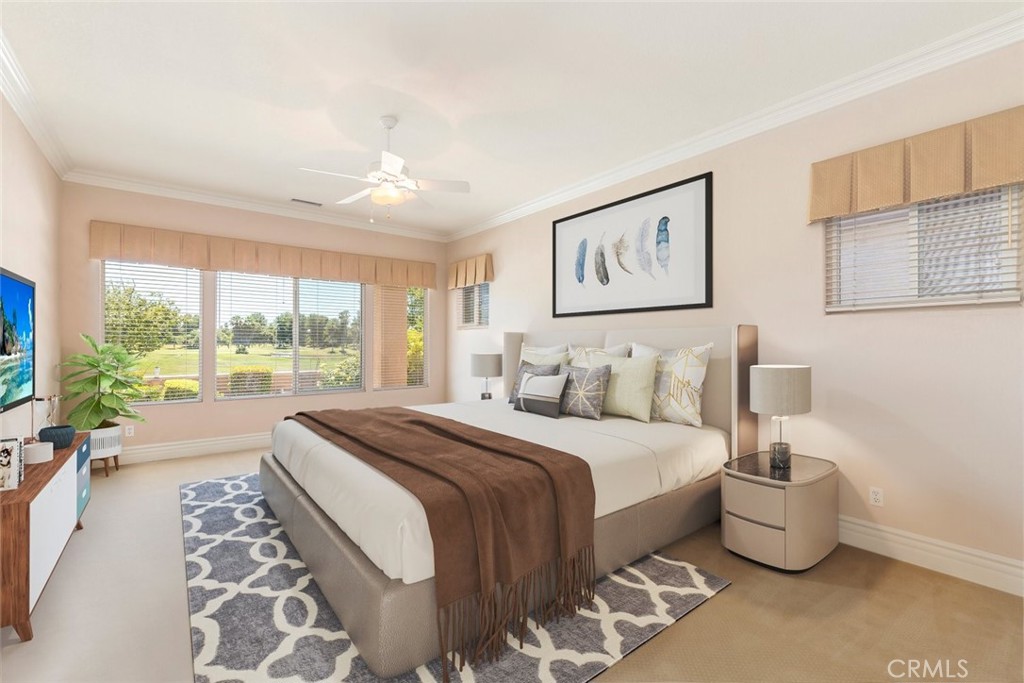 29546 Winding Brook Drive Menifee, CA 92584 - Photo 12 of 21 a bedroom with a bed and glass windows