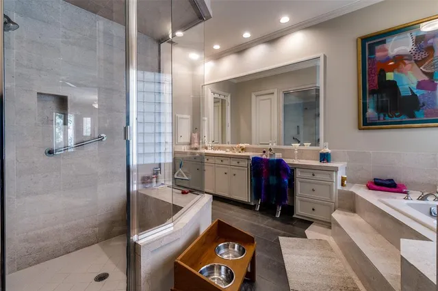 a bathroom with a sink a vanity and a mirror
