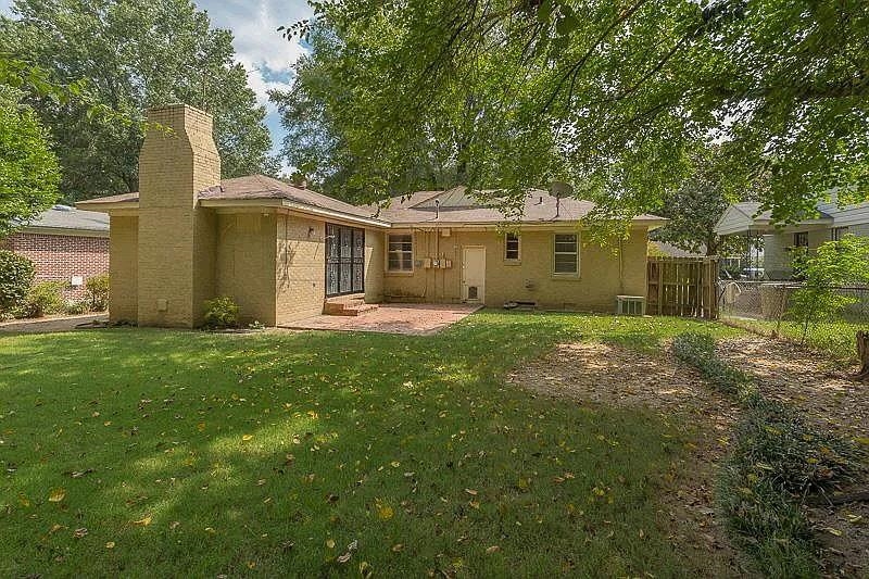 4974 Princeton Road Memphis, TN 38117 - Photo 10 of 10 Back of house with a patio area and a chimney