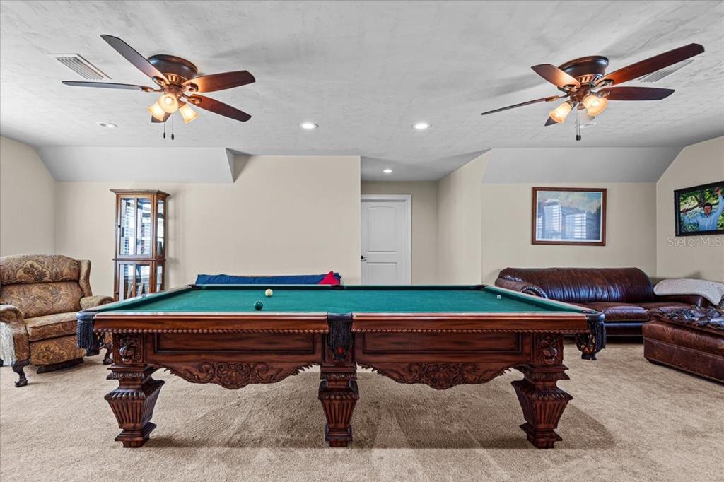 4107 Southwest State Road 45 Newberry, FL 32669 - Photo 45 of 100 a room with furniture and a ceiling fan