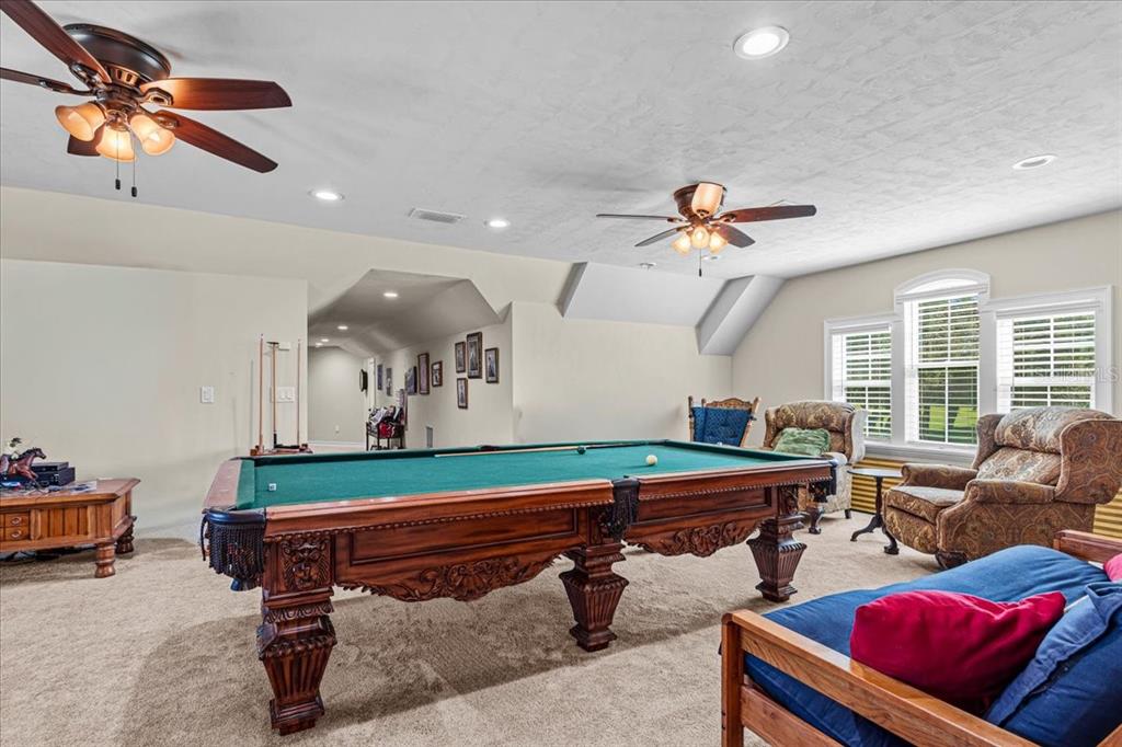 4107 Southwest State Road 45 Newberry, FL 32669 - Photo 54 of 100 a room with furniture and a ceiling fan