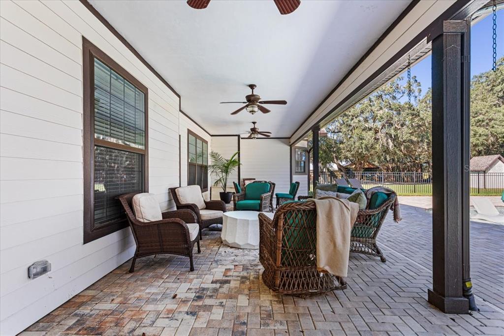 4107 Southwest State Road 45 Newberry, FL 32669 - Photo 56 of 100 a living room with furniture and a large window