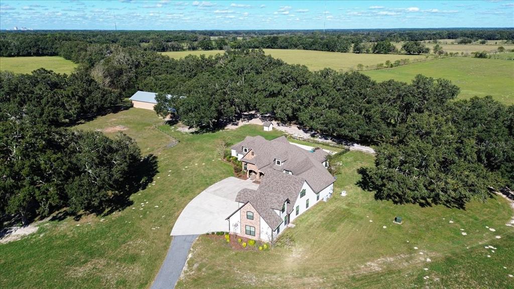 4107 Southwest State Road 45 Newberry, FL 32669 - Photo 70 of 100 an aerial view of a house with a yard