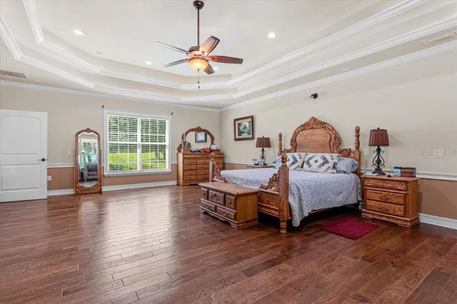a living room with fireplace furniture and a rug
