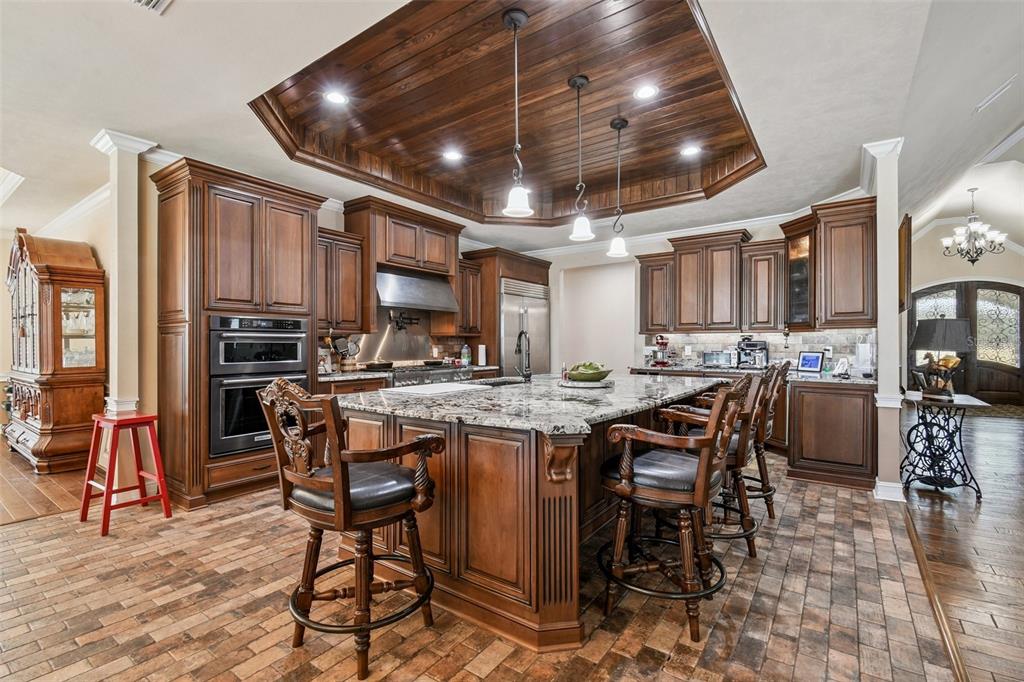 4107 Southwest State Road 45 Newberry, FL 32669 - Photo 95 of 100 a kitchen with lots of counter top space and appliances